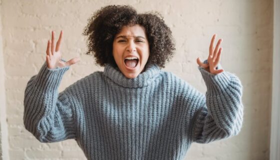 angry black woman screaming in room